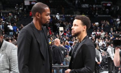 Curry, Durant reunite after Nets' win vs. Warriors
