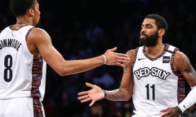 Kyrie signs Nets' jersey salvaged from fire for fan