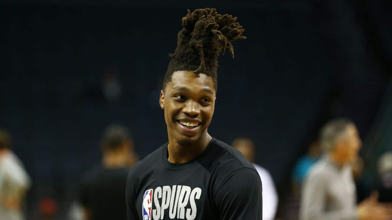 Spurs' Walker cuts hair, feels freed of painful past