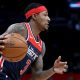 Beal, still undecided on playing, to travel with Wiz