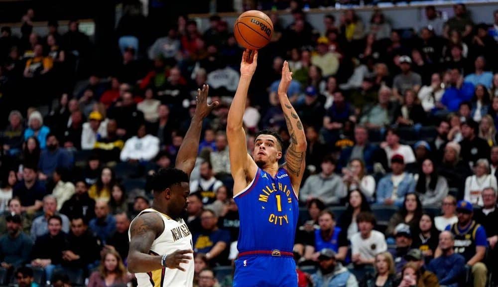 Malone says Nuggets 'not trading Michael Porter'