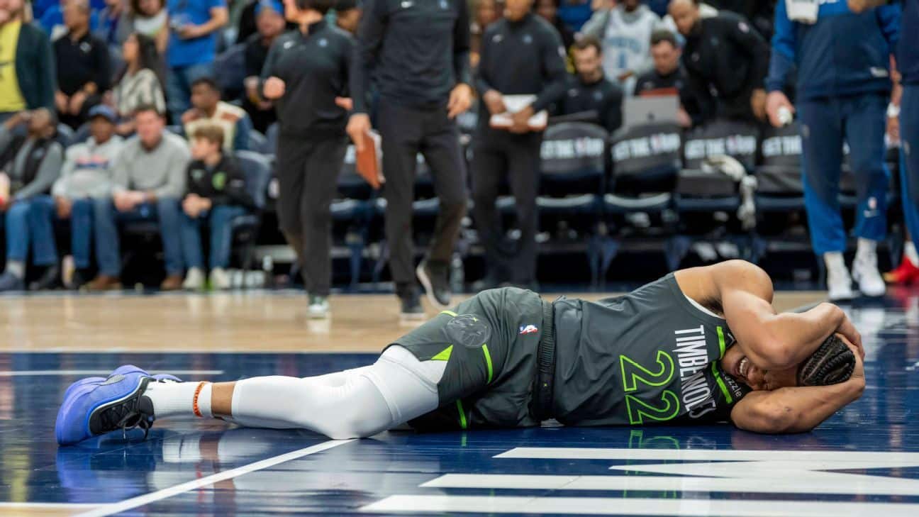 Timberwolves' Clark (neck) exits after hard fall