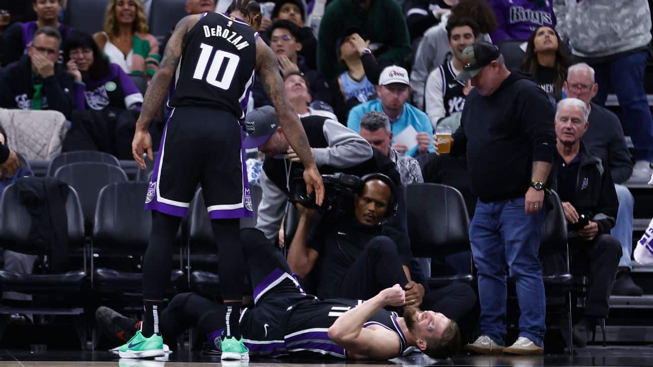 Kings' Sabonis cuts eye, returns, then rolls ankle
