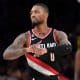 Injured Lillard glad to be 'back home' with Blazers