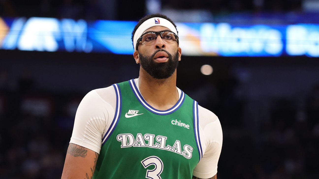 Sources: AD won't play until OK from Mavs owner