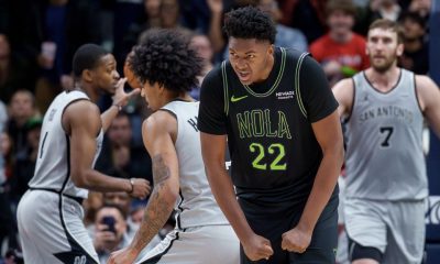 Harper spoils Queen's triple-double in rookie clash