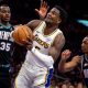 Ayton rebounds as Lakers feed big man early in win