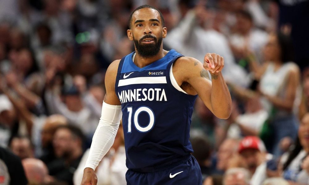 Conley back with Wolves two weeks after trade