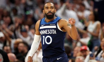 Conley back with Wolves two weeks after trade