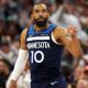 Conley back with Wolves two weeks after trade