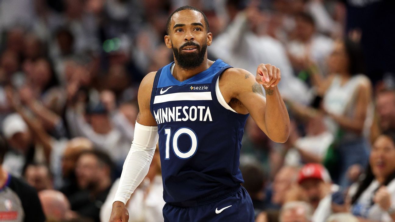 Conley back with Wolves two weeks after trade
